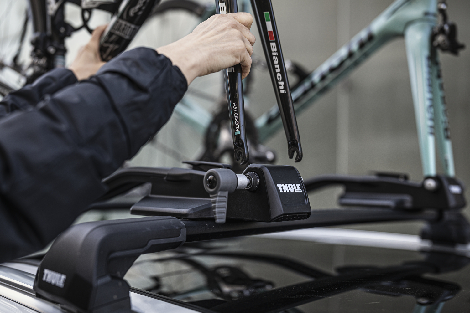 Two Thule 564 FastRide roof mounted cycle carriers fitted to Thule WingBar Edge roof bars