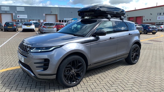 Land Rover Evoque with a Thule Motion L Glossy Black roof box & Thule WingBar Edge Black roof bars