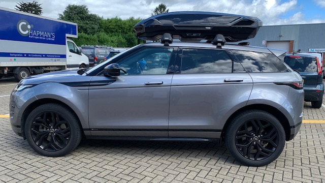 Land Rover Evoque with a Thule Motion L Glossy Black roof box & Thule WingBar Edge Black roof bars
